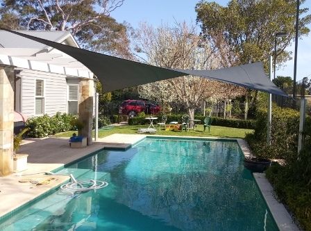This is a domestic swimmimg pool shade sail.
